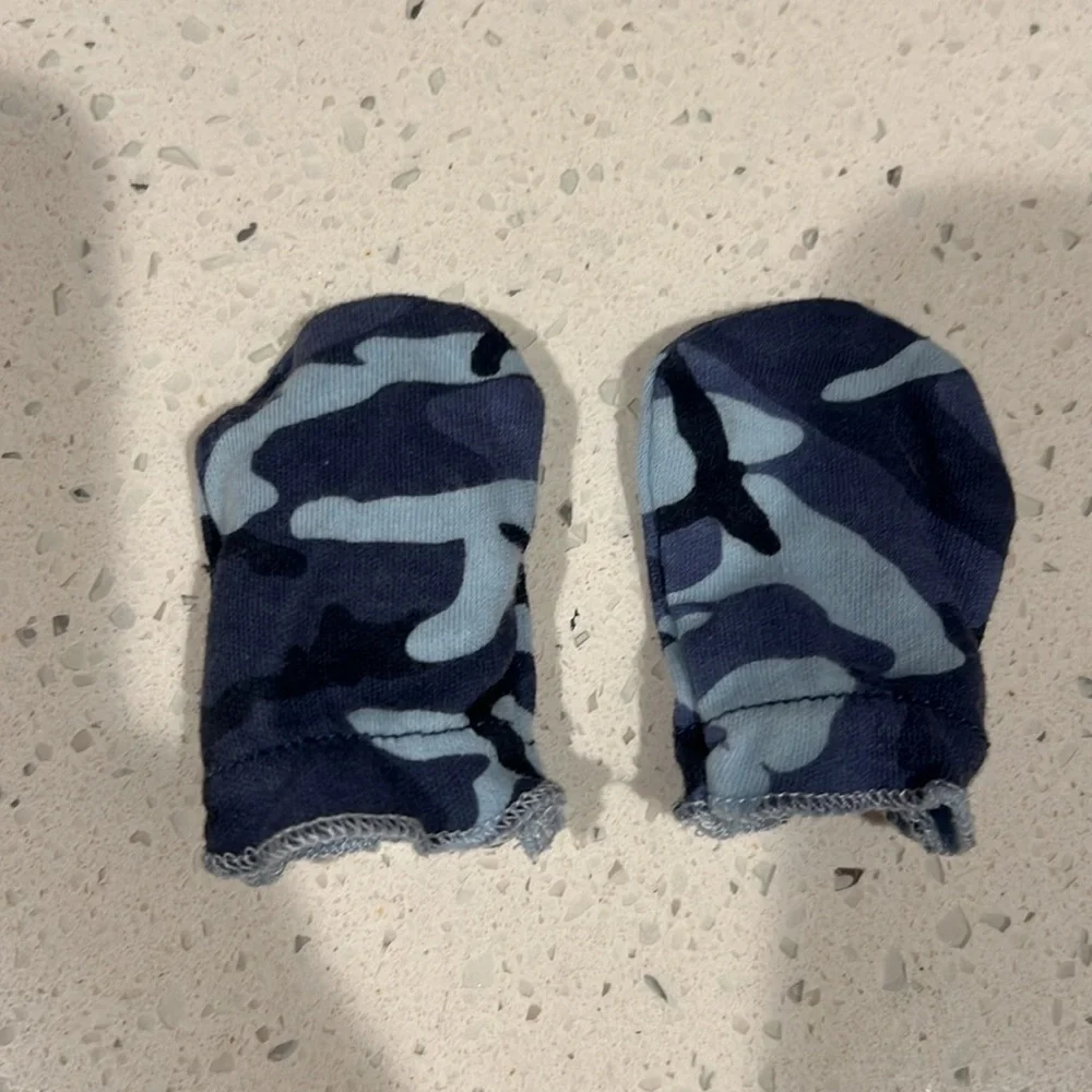 Three pairs of newborn mittens and one hat blue camo white stripes baby hospital